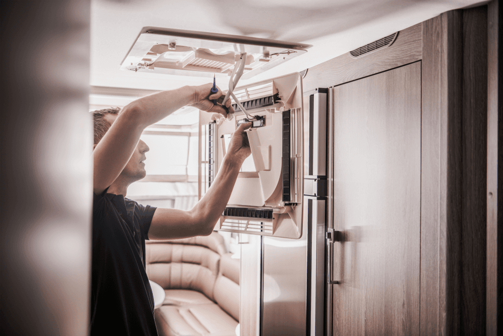 Technician diagnosing RV systems